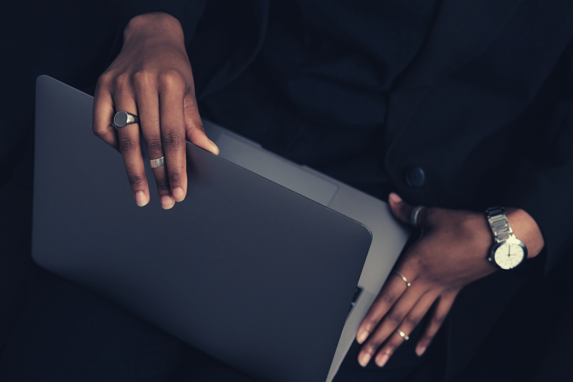 Woman Closing the Laptop
